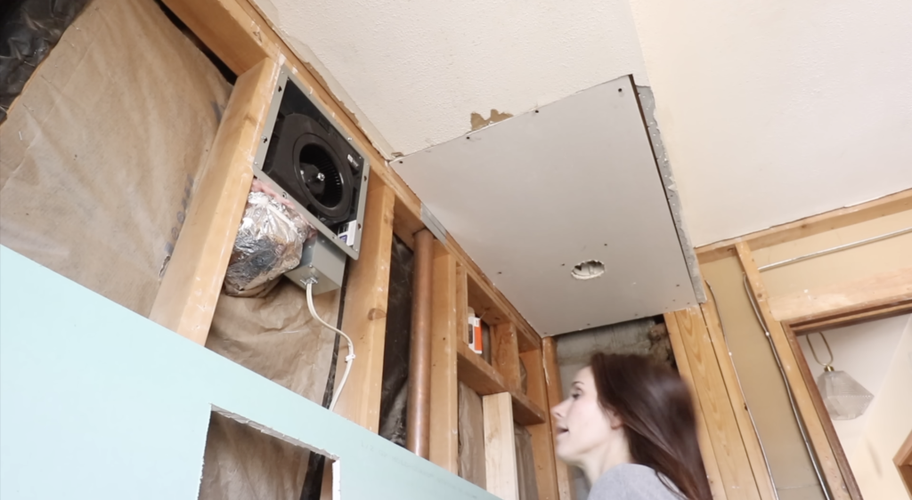 the piece of ceiling drywall screwed in place. 